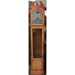 An antique style lightwood longcase clock, the dial with tempus fugit arch, Roman numerals, thirty