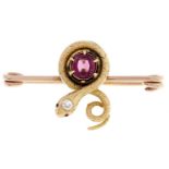 A Victorian ruby and diamond serpent jewel, c1870, on associated gold safety pin, serpent 23mm,