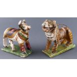 Two Indian polychrome white ground wood carvings of a tiger and white cow and calf, early 20th c,