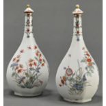 A pair of Samson octagonal kakiemon bottle vases and stoppers, in Chantilly style, late 19th c, 19cm
