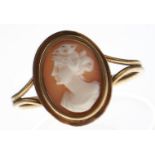 A cameo ring, in gold with wirework hoop marked 18k, 2.3g, size O Hoop slightly distorted