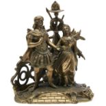 A French bronze group of a couple, late 19th c, standing on a lion's pelt before martial trophy,