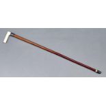 A Victorian walking stick, the ivory handle with chequer grip, silver collar with vacant shield