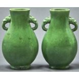 A pair of Chinese archaic style green monochrome glazed vases, of Hu form, 13.5cm h Good condition