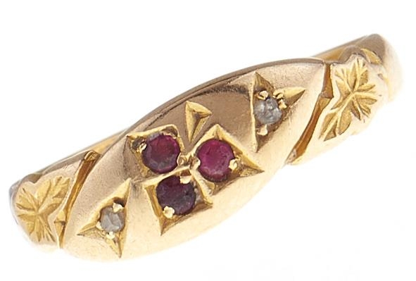 An Edwardian ruby and diamond ring, in 18ct gold, Birmingham 1903, 2.4g, size L Wear consistent with