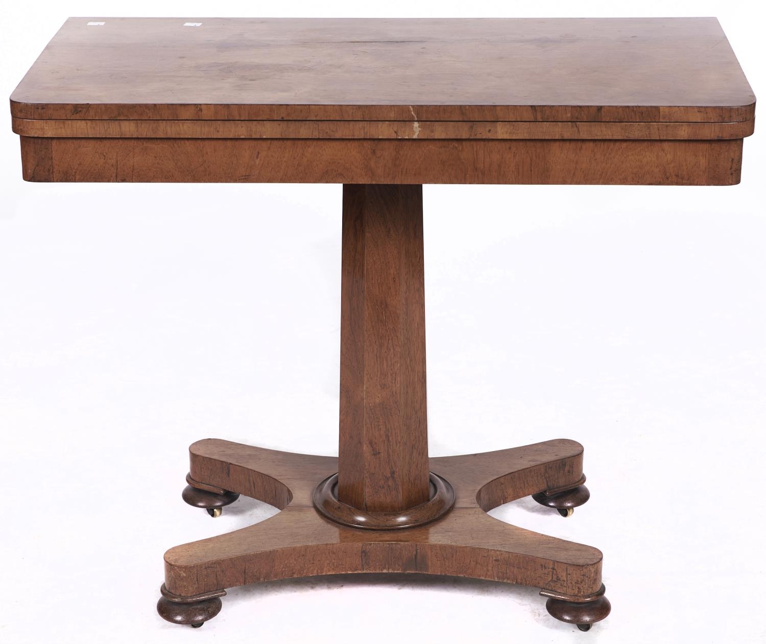 An early Victorian rosewood card table, on octagonal pillar, platform and bun feet, 91.5cm l Top