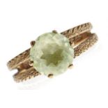 A green stone ring, in gold marked 9ct, 3.2g, size M Light wear