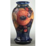 A Moorcroft miniature Pomegranate vase, 10.5cm h, impressed marks Good condition