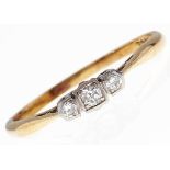 A three stone diamond ring, in gold marked 18ct, 2g, size O Good condition