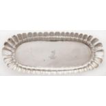 An Irish George II silver spoon tray, with fluted sides, crested, the underside engraved with