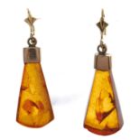 A pair of amber earrings, in gold marked 14k, 3.8g Good condition