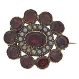 A garnet and seed pearl brooch, c1840, in gold, 5.6g Back of brooch dented