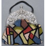 A Dutch Art Deco wool evening bag, with earlier silver cantle, c1930, 21cm h excluding handle,