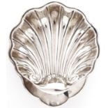 A George V silver butter shell, on three ball feet, 16cm l, Birmingham 1916, 3ozs Light wear, not