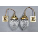 A pair of early electric brass corridor light pendants, Holophane Co, early 20th c, with moulded