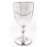 A Victorian silver cup on flared foot, engraved with presentation inscription and another on a later