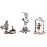A German parcel gilt miniature silver model of putto on a swing, 20th c, 60mm h, maker's and