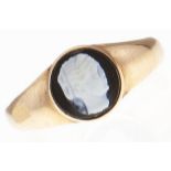 A hardstone cameo ring, 19th c, on associated gold band, unmarked, 3.2g, size O Wear consistent with