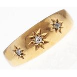 An Edwardian three stone diamond ring, gypsy set in 18ct gold, Chester, date letter rubbed, 2.1g,