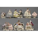 Five German porcelain groups and three figures, late 20th c, the lady's costumes of porcelain