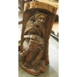 An African tree trunk carving of a man with a drum, 20th c, 85cm h Good condition