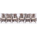 A set of fourteen George III mahogany dining chairs, c1770, with interlaced splat, the set including