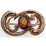 A Victorian citrine brooch, late 19th c, in gold, 10.6g Wear and solder repair