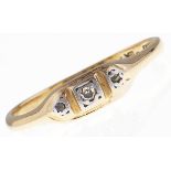 A three stone diamond ring, in gold marked 18ct PLAT, 2g, size M Hoop slightly distorted