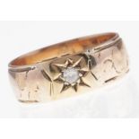 An Edwardian diamond ring, gypsy set, 9ct gold band, Chester 1902, 3.9g, size P Wear consistent with