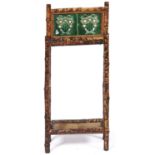 An Edwardian bamboo stick stand, inset pair of 6" green glazed wall tiles, metal drip tray, 86.5cm h
