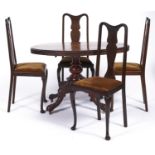 A Victorian walnut oval loo or centre table, inlaid to the centre with foliate oval, boxwood