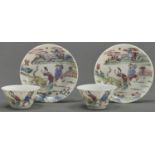 A pair of Chinese famille rose tea bowls and saucers, Qing dynasty, Qinglong period, enamelled