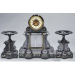 A French marble and nero belge garniture de cheminee, late 19th c, the drum cased movement with