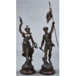 A pair of French fin de siecle bronzed spelter statuettes of a semi naked youth and maiden,