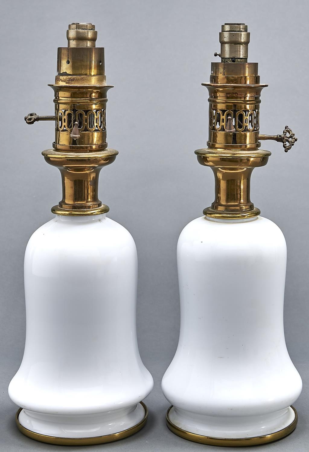 A pair of Victorian brass mounted opal glass oil lamps, Bright (late Argand & Co) 37 Bruton St