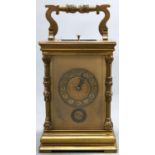 A French brass carriage clock, c1900  the gilt dial with silvered chapter ring and alarm ring, blued