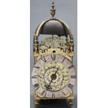 A brass lantern clock, Thomas Bagley, Londini, c1670, the dial engraved with tulips, silvered