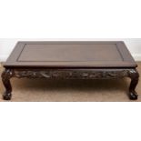 A Chinese hardwood low table, 20th c, with pierced and carved dragon frieze on zoomorphic legs, 35cm