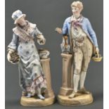 A pair of French biscuit figures of a gardener and his companion, c1880, painted in a pastel palette