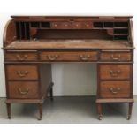 An Edwardian mahogany tambour topped desk, c1905, the rectangular top above a tambour cover