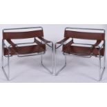 Wassily Kandinsky (after) - a pair of reproduction chairs in brown leather with black stitching,