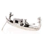 A German miniature silver model of a Venetian gondola and two gondoliers, 13.5cms l, bearing