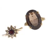 A citrine ring and a garnet and white stone cluster ring, mid 20th c, both in 9ct gold, sizes K½ and