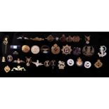 Miscellaneous brass and other metal badges and insignia (27)