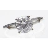 A synthetic spinel ring, in white gold marked 14k, 2.8g, size O Light wear