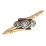 A three stone diamond ring, in gold, marks rubbed, 2.3g, size V Wear consistent with age