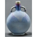 A Chinese flambe glazed moon flask, with bamboo form handle, 19cm h Good condition