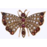 A garnet and split pearl butterfly brooch,  in 9ct gold, 34mm, marks rubbed, 7g Complete, little