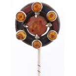 A silver, Scottish hardstone and citrine paste stick pin, c1900