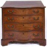 A George III serpentine mahogany dressing chest, late 18th c, the top drawer with slide and